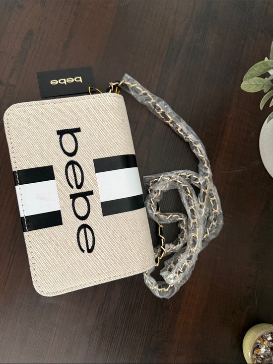 bebe Handbags - bebe Beige Canvas Crossbody with Black Stripe and Gold Chain